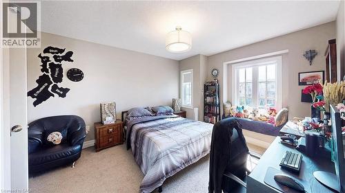Bedroom with carpet flooring and an office area - 537 Millstream Drive, Waterloo, ON - Indoor Photo Showing Bedroom