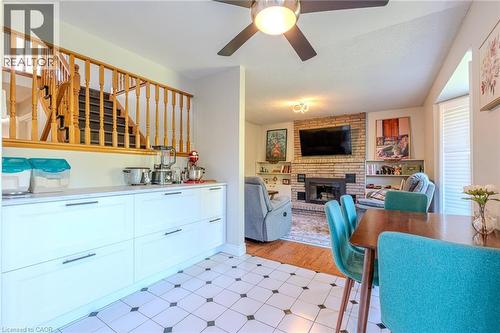 14 Windstar Place Unit# Upper, Hamilton, ON - Indoor Photo Showing Dining Room With Fireplace