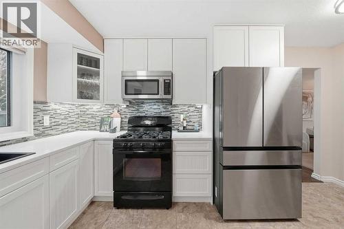 471 Dalmeny Hill Nw, Calgary, AB - Indoor Photo Showing Kitchen