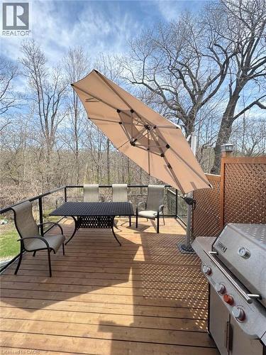 Wooden deck with outdoor dining area and grilling area - 2429 Whitehorn Drive, Burlington, ON - Outdoor With Deck Patio Veranda