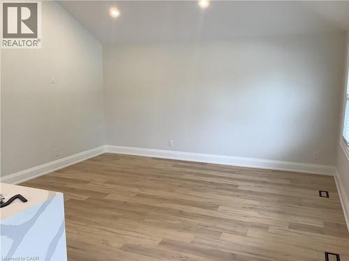 Spare room featuring light wood-type flooring and recessed lighting - 229 West 18Th Street, Hamilton, ON - Indoor Photo Showing Other Room