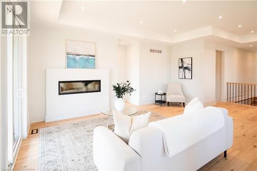 19 Oakley Drive, Niagara-On-The-Lake, ON - Indoor Photo Showing Living Room With Fireplace