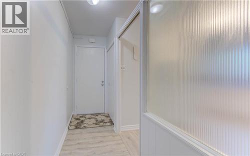 Hall featuring light wood-style flooring and baseboards - 50 Gordon Avenue, Kitchener, ON - Indoor Photo Showing Other Room