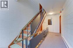 Staircase with a baseboard radiator and carpet - 