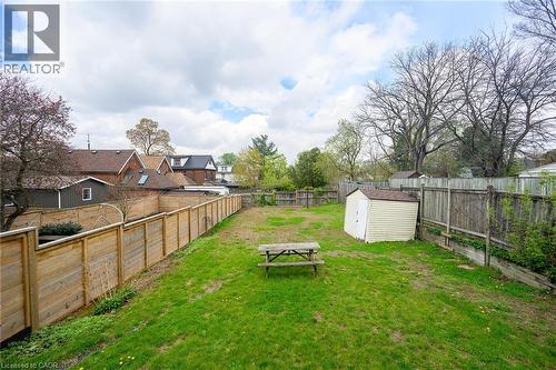 View of yard featuring a shed and an outbuilding - 129 Dundurn Street N, Hamilton, ON - Outdoor