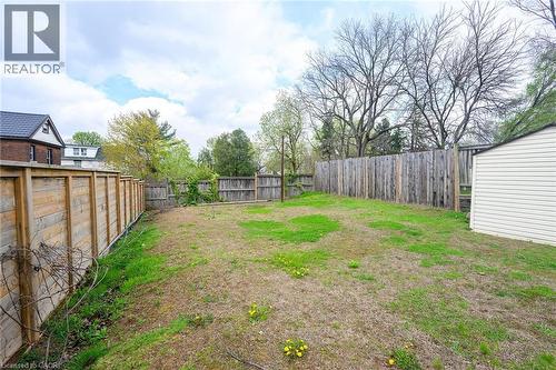 View of fenced backyard - 129 Dundurn Street N, Hamilton, ON - Outdoor