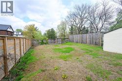 View of fenced backyard - 