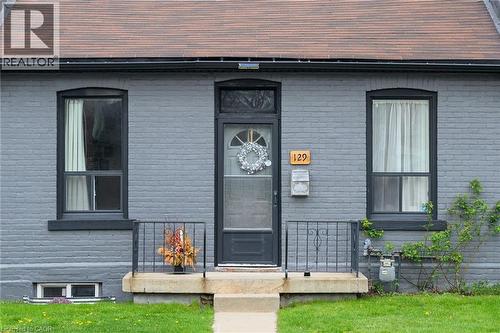 Doorway to property featuring brick siding - 129 Dundurn Street N, Hamilton, ON - Outdoor
