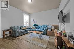 Living area featuring wood finished floors - 