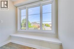 Detailed view of wood finished floors and baseboards - 