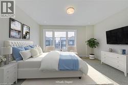 Carpeted bedroom with baseboards and recessed lighting - 