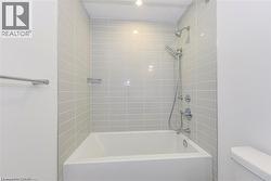 Full bathroom with shower / washtub combination and toilet - 