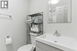 Bathroom with a shower and vanity - 