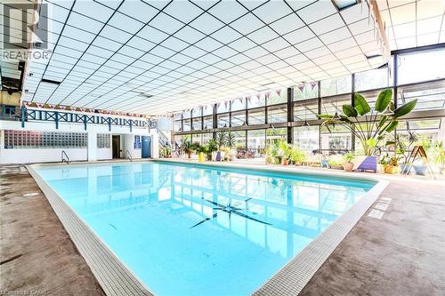 Indoor community pool with a patio - 57 12Th Conc Road E Unit# 430, Flamborough, ON - Indoor Photo Showing Other Room With In Ground Pool