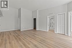 View of front closet, den entry, bathroom entry, HWT closet. - 