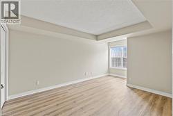 Primary bedroom with sitting area, backing onto forest. - 