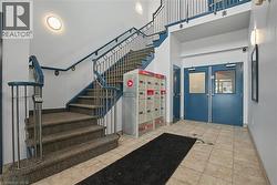 Building entrance with access to main floor as well as the upper floor - 