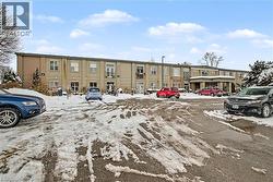 View of the building and parking lot for residents - 