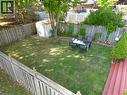 Fenced backyard featuring a storage shed - 75 Marisa Street, Kitchener, ON  - Outdoor With Deck Patio Veranda With Backyard 