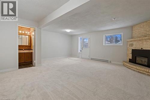 67 Old Carriage Drive, Kitchener, ON - Indoor With Fireplace