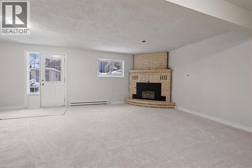67 Old Carriage Drive, Kitchener, ON - Indoor With Fireplace