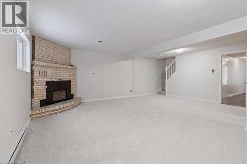 67 Old Carriage Drive, Kitchener, ON - Indoor With Fireplace