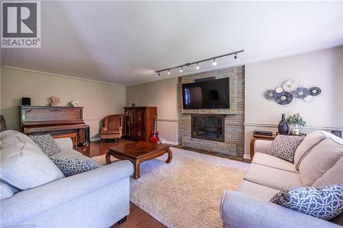 6 Summit Circle, Simcoe, ON - Indoor Photo Showing Living Room With Fireplace