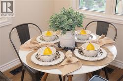 Dining room with wood finished floors - 