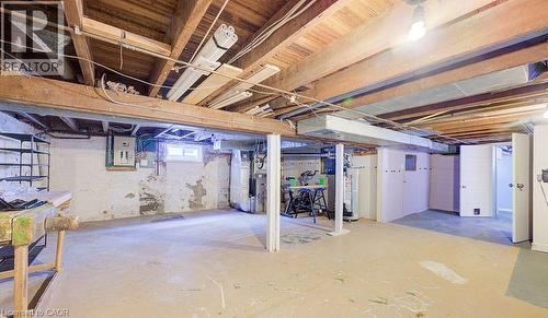 Below grade area featuring heating unit and electric panel - 14 Grandview Street, Brantford, ON - Indoor Photo Showing Basement