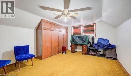 Bonus room with lofted ceiling, light colored carpet, and ceiling fan - 14 Grandview Street, Brantford, ON - Indoor Photo Showing Other Room