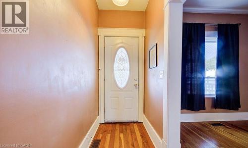 Entryway with wood-type flooring and baseboards - 14 Grandview Street, Brantford, ON - Indoor Photo Showing Other Room