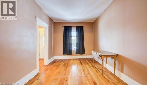 Unfurnished room with light wood-style floors and baseboards - 14 Grandview Street, Brantford, ON - Indoor Photo Showing Other Room