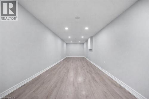 Unfurnished room with recessed lighting and light wood-style flooring - 106 Lottridge Street, Hamilton, ON - Indoor Photo Showing Other Room