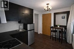 Unit 4 Kitchen/ Dinning - Image AI generated to remove Tenants belongings, Unit is similar to picture but may not be identical - Photo is for information purposes only. - 