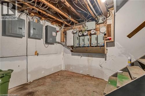 Utility room featuring electric panel - 70 Ottawa Street N, Hamilton, ON - Indoor Photo Showing Basement