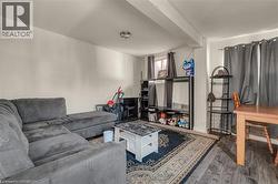 Living area featuring wood finished floors - 