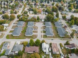 Aerial view of property's location with nearby suburban area - 