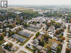 Aerial view of property's location with nearby suburban area - 