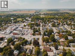 Aerial perspective of suburban area featuring a tree filled landscape - 