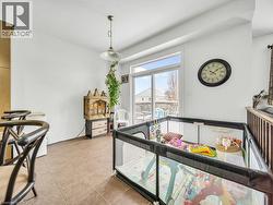 Bedroom with light tile patterned flooring and access to exterior - 