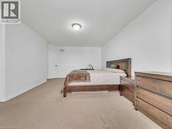 Bedroom with carpet floors and baseboards - 