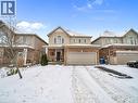 View of front facade with a porch, brick siding, and a garage - 3 Creighton Avenue, Guelph, ON  - Outdoor With Facade 