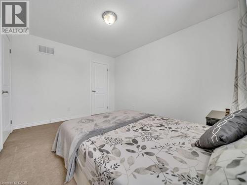 Bedroom featuring carpet and baseboards - 3 Creighton Avenue, Guelph, ON - Indoor Photo Showing Bedroom