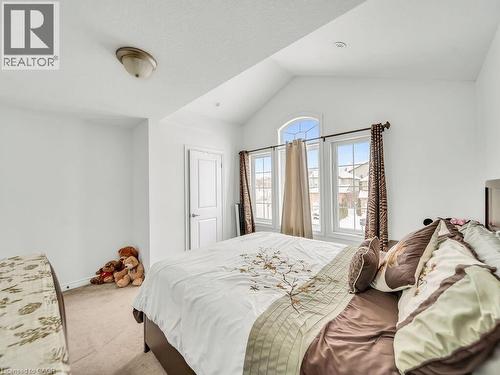 Carpeted bedroom featuring lofted ceiling - 3 Creighton Avenue, Guelph, ON - Indoor Photo Showing Bedroom