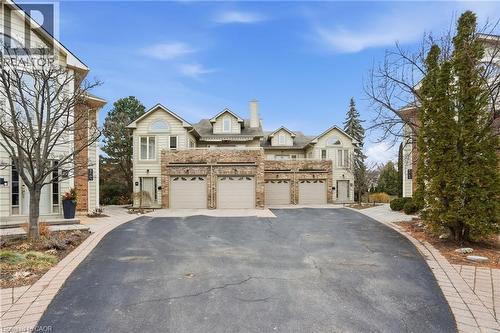 View of front of unit block - 3230 New Street Unit# 7, Burlington, ON - Outdoor With Facade