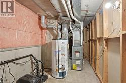 Utility room with gas water heater - 