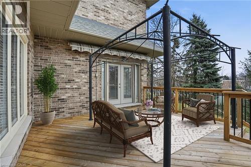 Deck with french doors and an outdoor hangout area - 3230 New Street Unit# 7, Burlington, ON - Outdoor With Deck Patio Veranda With Exterior