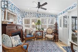 Den/Sunroom with French Doors and Walk out to Enclosed Porch - 