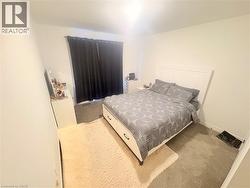 Bedroom featuring carpet - 