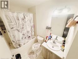 Full bath with shower / bath combination with curtain and vanity - 